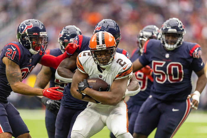 Cleveland Browns Amari Coooper drives past multiple Houston Texans defenders after a gain of 53 yards in the first quarter at NRG Stadium in Houston, Texas.